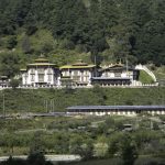 Scenic views of mountains, forests, and traditional villages along the Bumthang cultural trek in Bhutan.