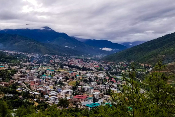 Stunning Bhutanese landscapes, traditional architecture, and cultural landmarks featured on a 9-day classic Bhutan tour.
