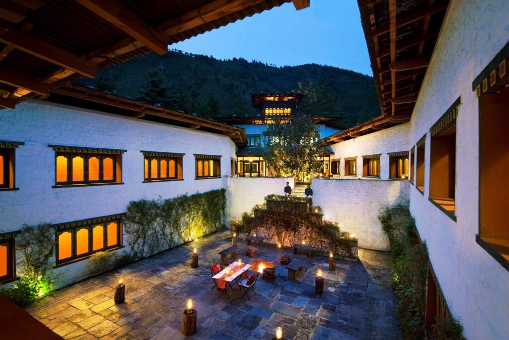 COMO Uma Paro luxury resort with traditional Bhutanese architecture and scenic Himalayan valley views.