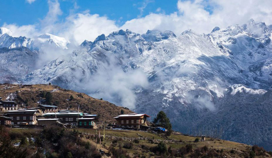 Laya village in Bhutan at 3,840m with traditional houses and Himalayan mountain scenery.