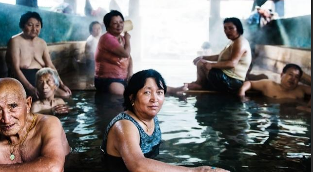 Dur Hot Spring in Bumthang, Bhutan, surrounded by lush forests with natural mineral-rich hot springs in a peaceful Himalayan setting.