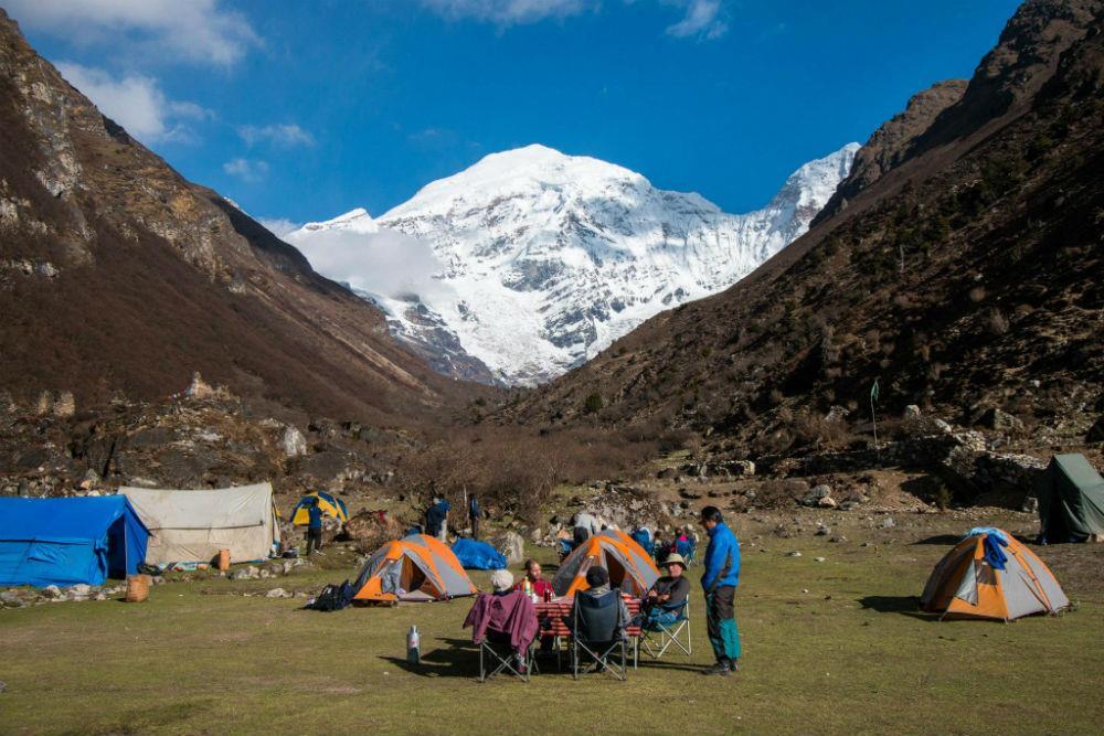 Gaytsa Camp on the Dur Hot Spring Trek surrounded by Bhutan's forests and Himalayan landscapes.
